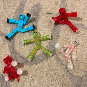 Colorful Suction-Cup Action Figures - Blue, Red, Green, Clear